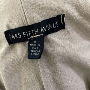 Saks 5th. Ave, top. Racer back straps Sequin accents.
Balloon effect elastic hem